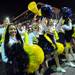 Michigan cheerleaders march in the Outback Bowl New Year's eve parade in Ybor City, Fla. on Monday night. Melanie Maxwell I AnnArbor.com